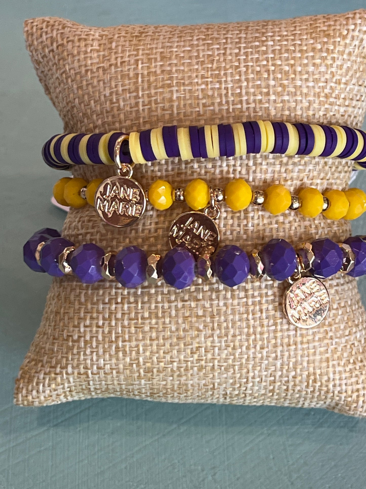 JM Purple & Gold Singles